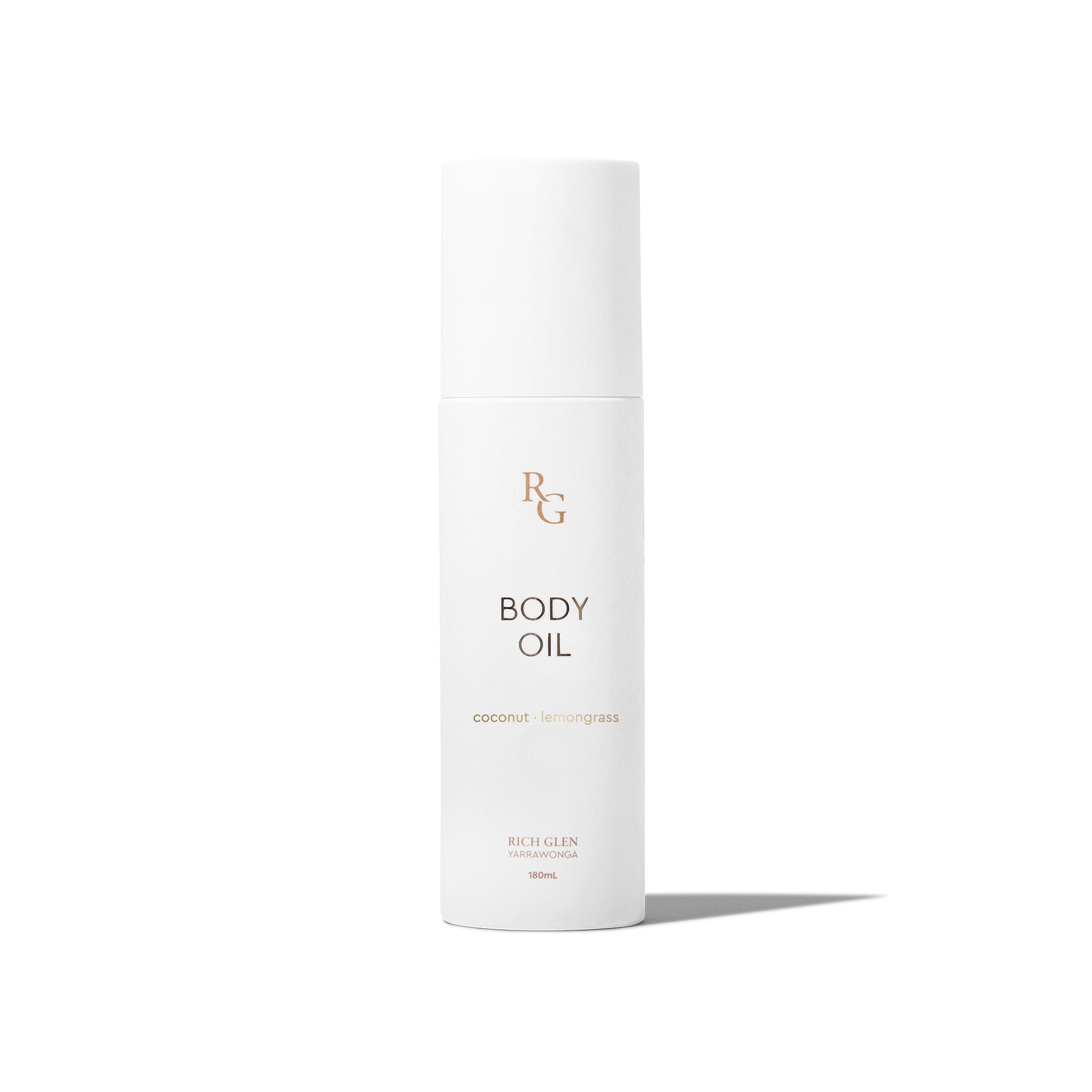 Tube of Rich Glen's Coconut & Lemongrass Body Oil on table